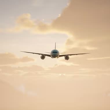 Avion en vol au lever du soleil illustrant les services de maintenance aéronautique de Sabena technics
